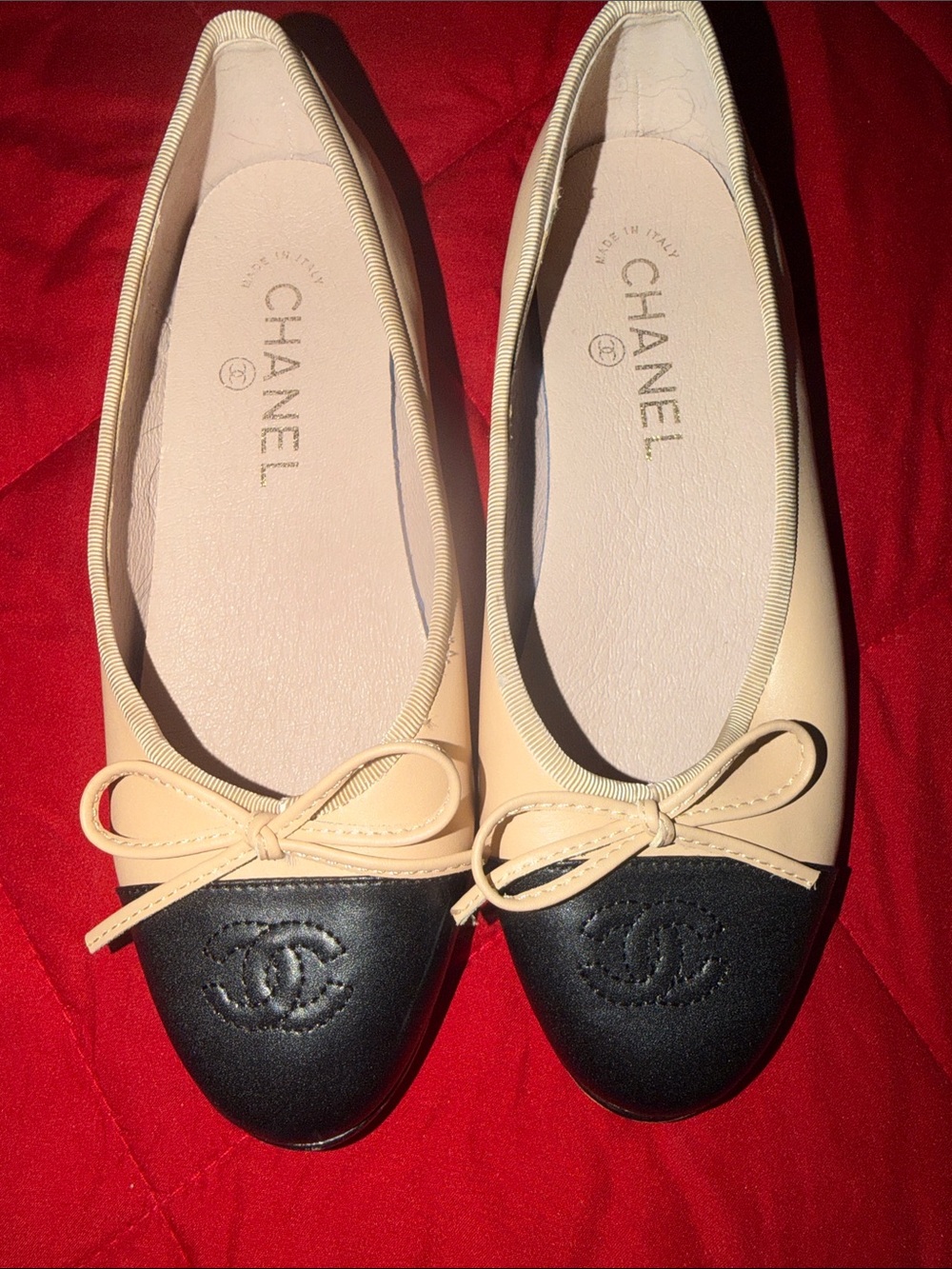 CHANEL Two-Tone Beige and Black Cap-Toe Leather Ballet Flats